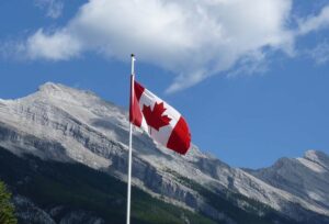 Canada Flag in the rocky mountains