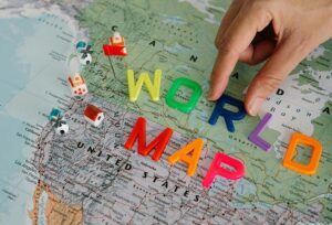 Map of Canada and USA with children's letters spelling out world map